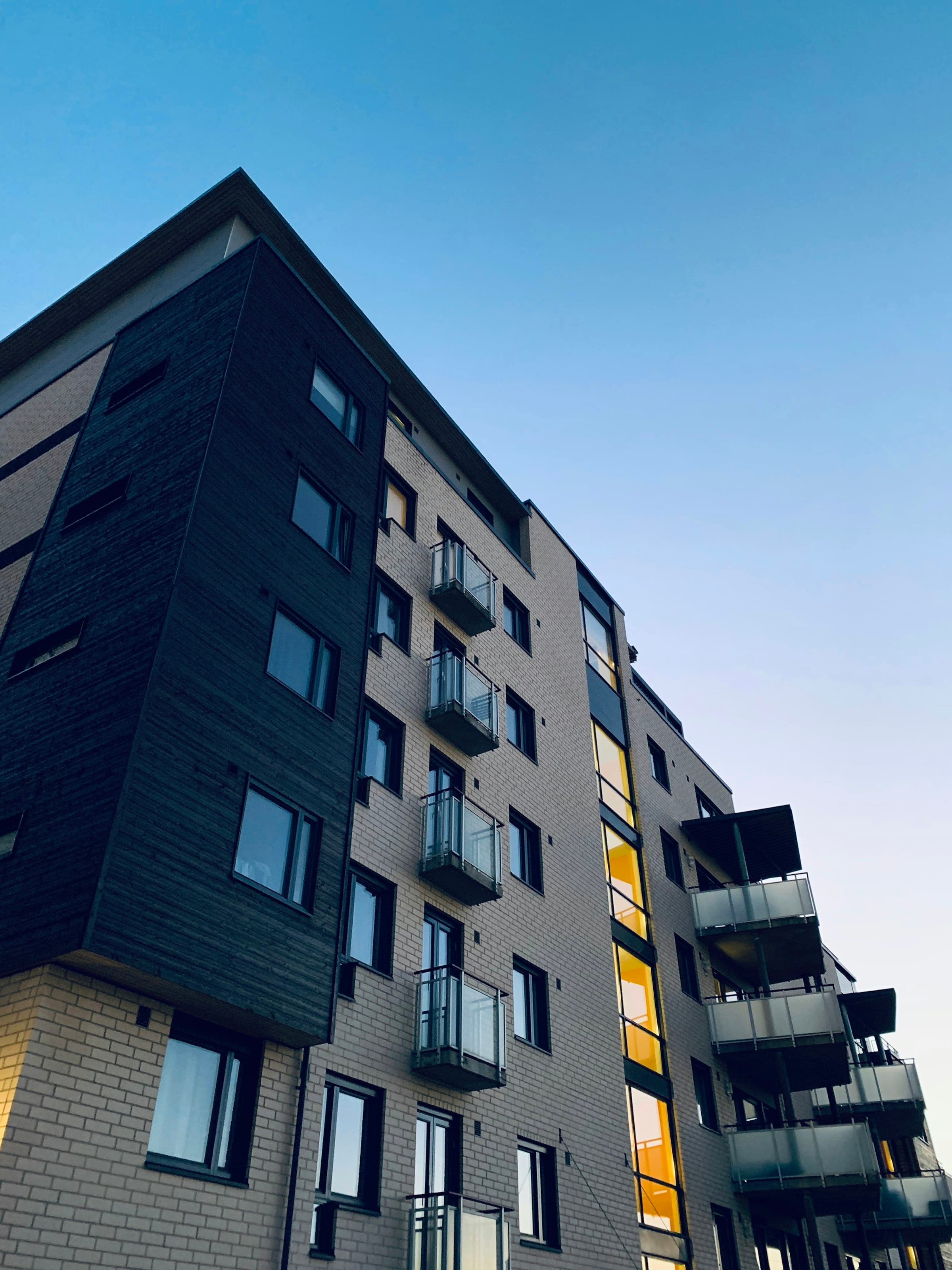 Modern multifamily facade — representative of the income-producing assets we finance
